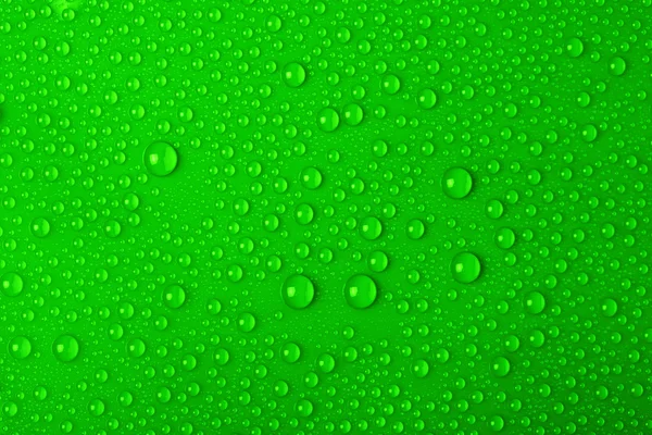 Gotas sobre fondo verde — Foto de Stock