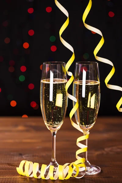 Champagne Wine against Christmas lights — Stock Photo, Image