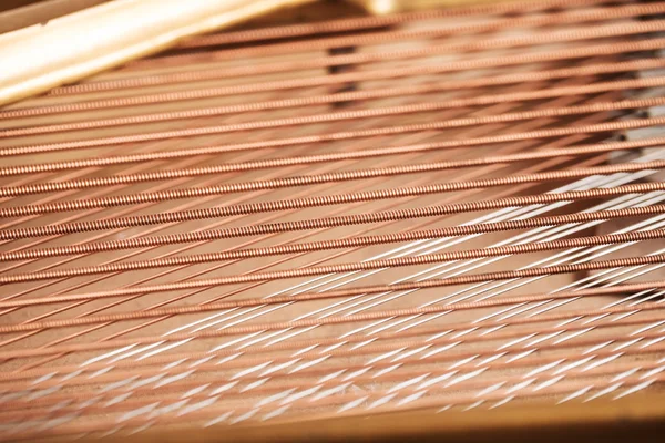 Piano strings and structure — Stock Photo, Image
