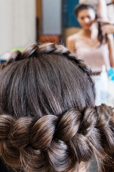 girl with braid in the mirror