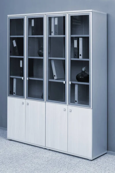bookcase with folders in a modern office