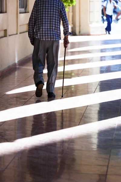 An old man with cane — Stock Photo, Image