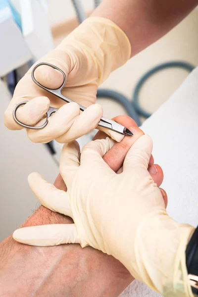 Een pedicure man — Stockfoto