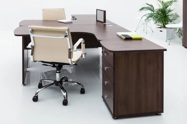 Desks and leather chairs Stock Photo