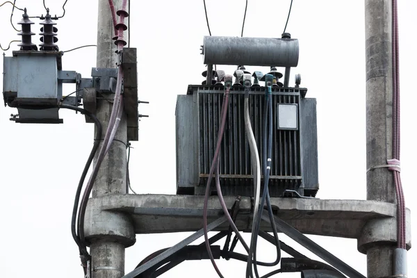 Electrical transformer on a pole — Stock Photo, Image