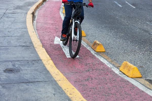 Bicyclist red bike path — Stock Photo, Image