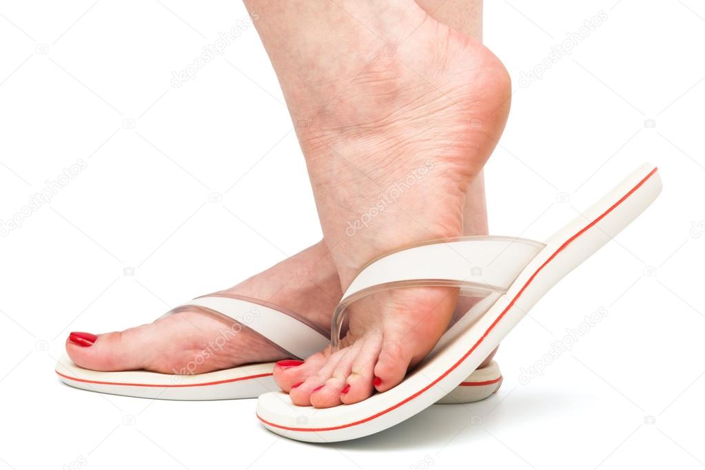 feet in sandal on white background