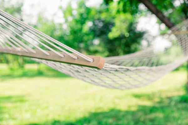 White hammock among the trees