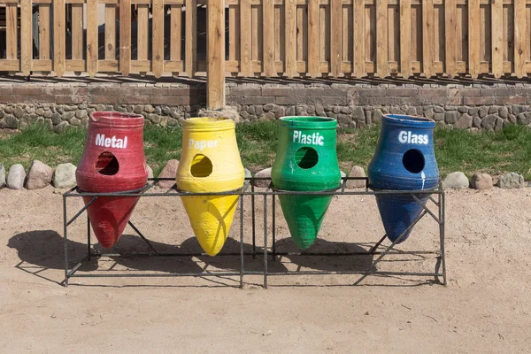 Four bins for separate waste collection — Stock Photo, Image