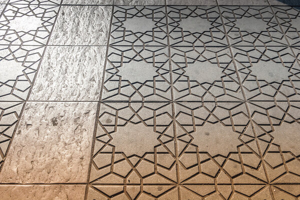 Ornamental pavement on the street of Marrakesh, Morocco
