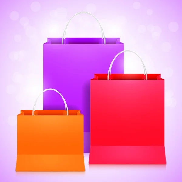 Farbliche Einkaufstaschen — Stockvektor