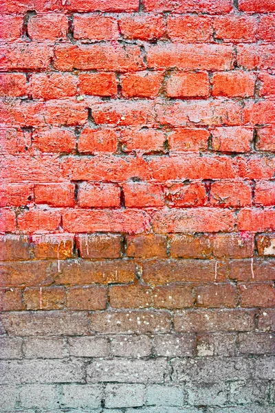 Old Bricks wall Painted in orange color, half weathered — Stock Photo, Image