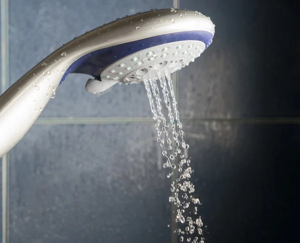 Shower head with stream of water spead out — Stock Photo, Image