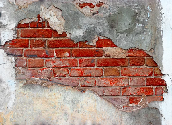Plasterd rode bakstenen muur — Stockfoto