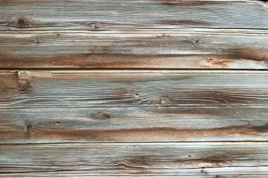 Yıpranmış ahşap kalaslardan yapılmış duvarın yakın çekim