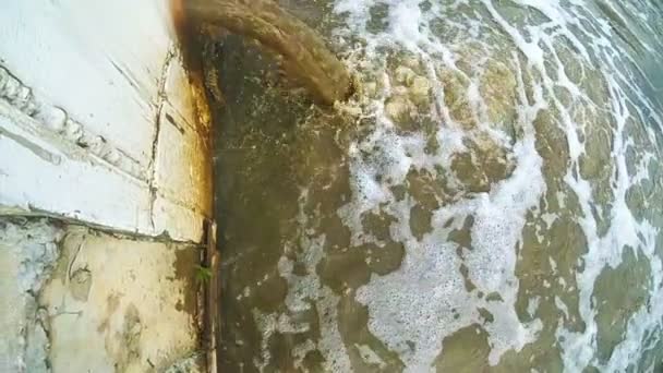 Sewage stream from pipe. Wastewater discharging into river — Stock Video