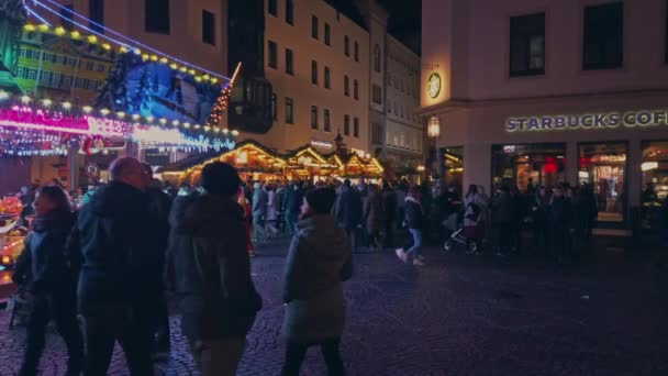 Bonn Germany, 23 Dec 2019: Christmas market roundabout. A lot of people go around slow motion — Stockvideo