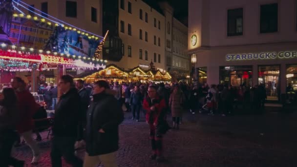 Bonn Germany, 23 Dec 2019: Christmas fair. A lot of people go around slow motion — Stockvideo
