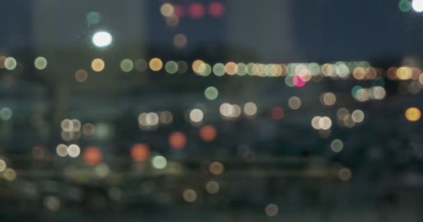 Wiele świateł miejskich rozmytych na panoramie nocy — Wideo stockowe