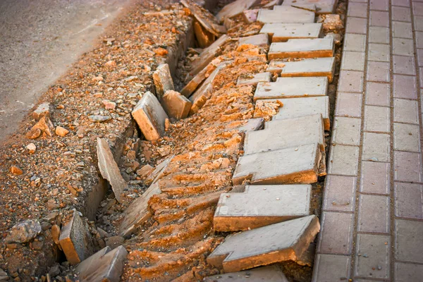 Construction Piles Sand Stones Lying Sidewalk Pits Installing Roadway Footpath — Stock Photo, Image