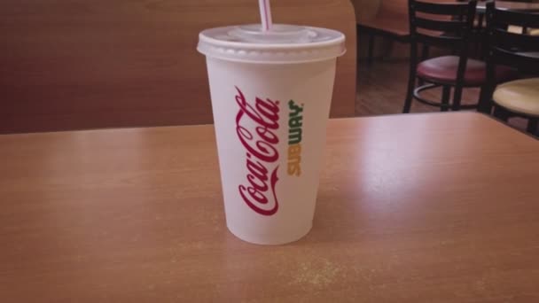 러시아 아스트라한, 2021 년 6 월 26 일 : Coca-Cola, Subway set on table zoom-in shot — 비디오