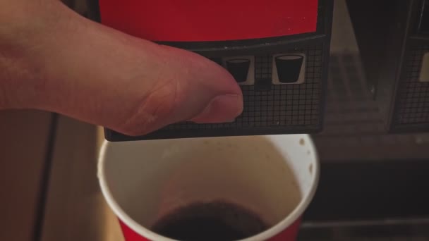 Pouring soft drink soda cola into paper cup using machine — Stock Video