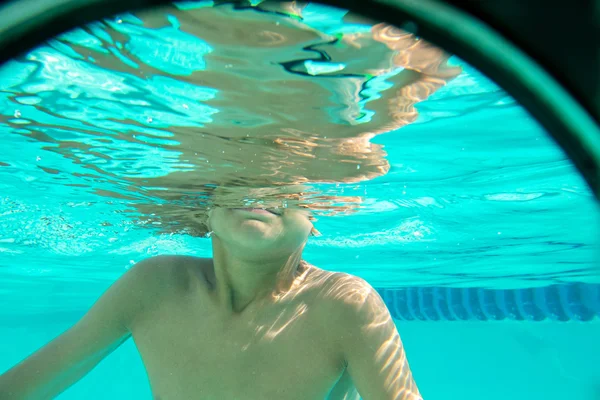 Boy half in water underwater photo — Stock Photo, Image