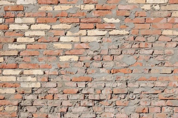 Red obsolete brick wall background — Stock Photo, Image