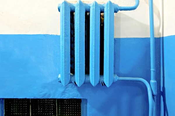 Old vintage iron heater radiator painted in blue lot of copyspace — Stock Photo, Image