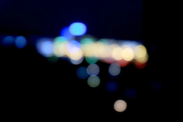 Luzes turvas da cidade à noite — Fotografia de Stock