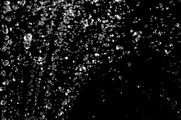 Gotas congeladas de água no ar, imagem de close-up . — Fotografia de Stock