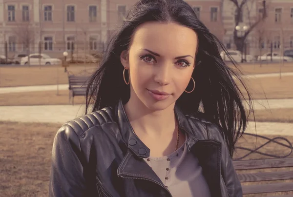 Young women toned portrait outdoors. Very tender brunette looking at camera. — Stock Photo, Image