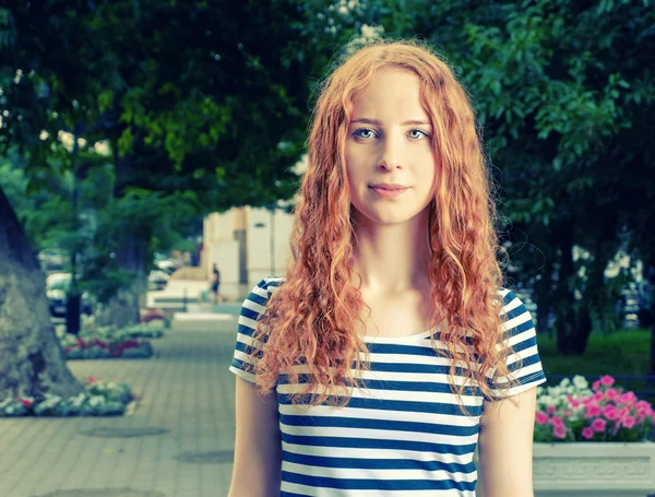 Ginger haired woman  looking at camera. — ストック写真