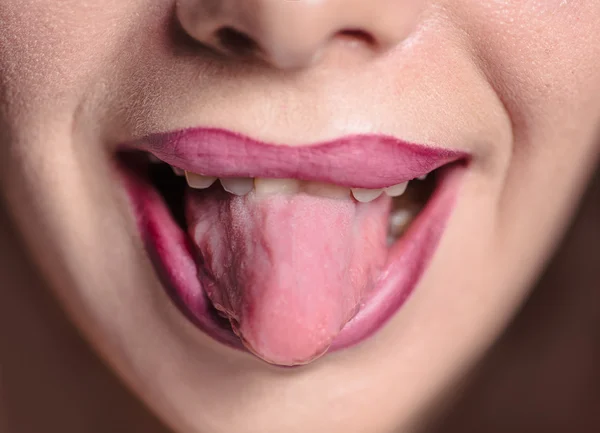 Tongue out lips with makeup — Stock Photo, Image