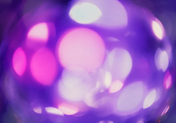 Abstrakter violetter Hintergrund mit Kreisen. Urlaub rosa Bokeh. Defokussierter Hintergrund — Stockfoto