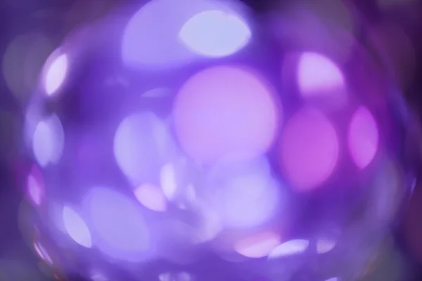 Fondo violeta abstracto con círculos. Bokeh rosa navideño. Fondo de pantalla desenfocado —  Fotos de Stock