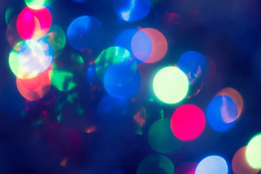 Noel arka plan. Parlayan soyut Defocused arka plan ile yanıp sönen ışıklar tatil. Bulanık Bokeh. Retro renk Vintage Fotoğraf tonda