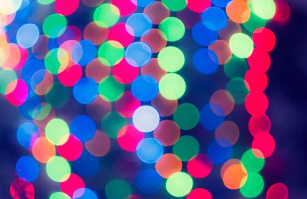 Decoração de Natal desfocado bokeh luzes na noite — Fotografia de Stock