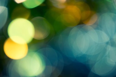 Yeşil ve altın arka plan. Tatil parlayan soyut glitter arka plan defocused