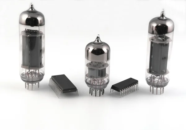 Vacuum radio tubes and microchips — Stock Photo, Image