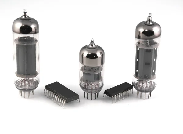 Vacuum radio tubes and microchips — Stock Photo, Image