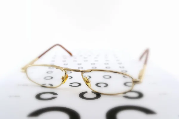 Brýle na stupnici oftalmologické — Stock fotografie