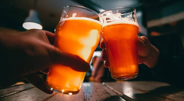 Close View Two Glass Beer Hand Beer Glasses Clinking Bar — Stock Photo, Image