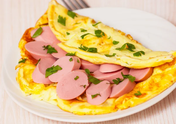 Omelet with sausage — Stock Photo, Image