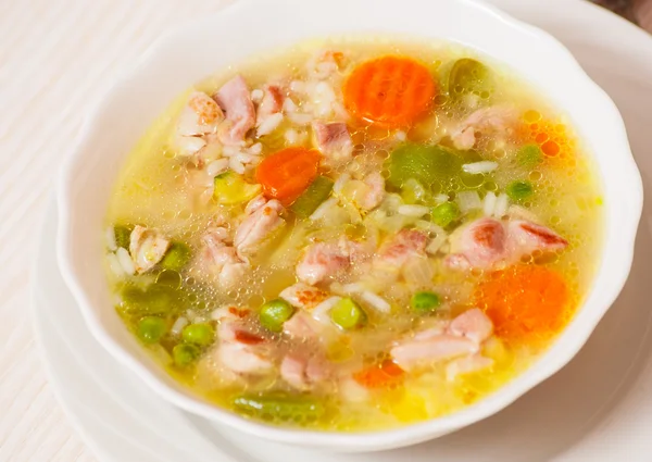 Soup with meat, vegetables and rice — Stock Photo, Image