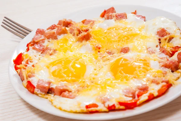 Eggs with ham and cheese — Stock Photo, Image