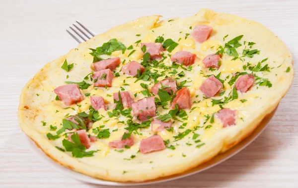 Omelet with ham and cheese — Stock Photo, Image