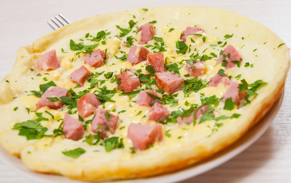 Omelet with ham and cheese — Stock Photo, Image