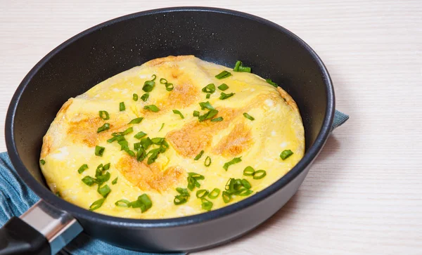 Omelet in a frying pan — Stock Photo, Image