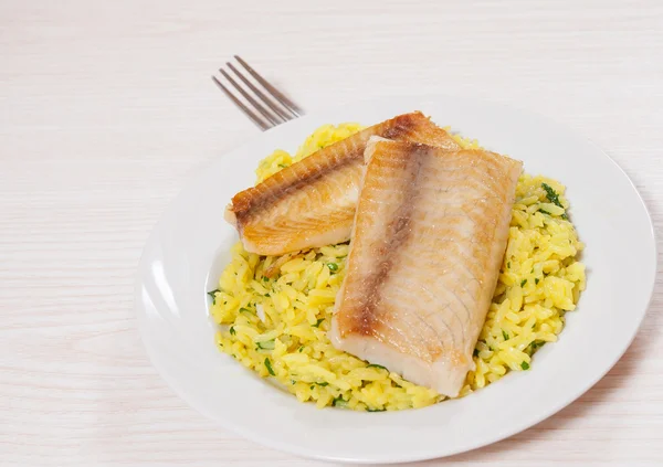 Fish fillet with rice — Stock Photo, Image
